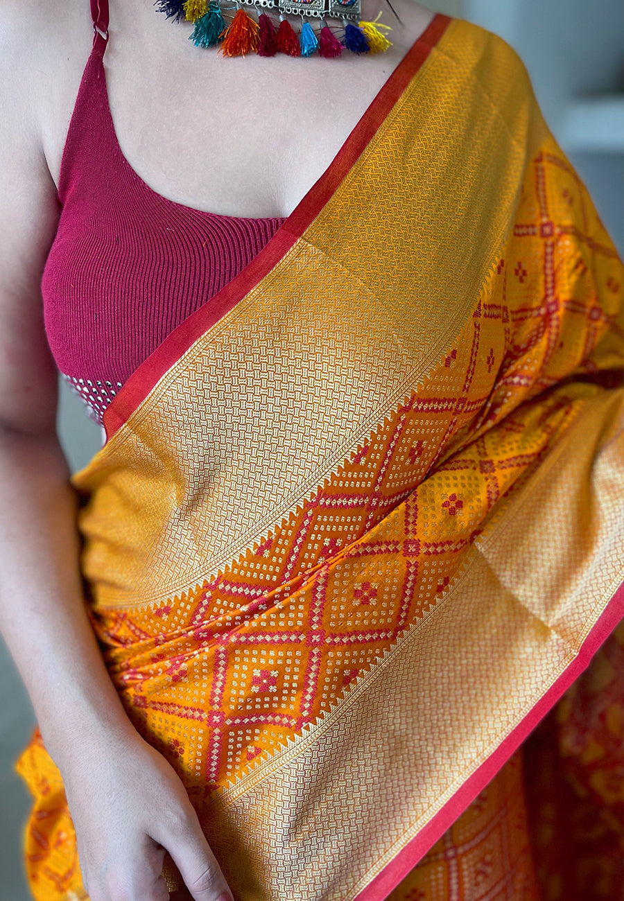 Mustard Yellow Beautiful Bandhej Patola Meenakari Zari Woven Saree