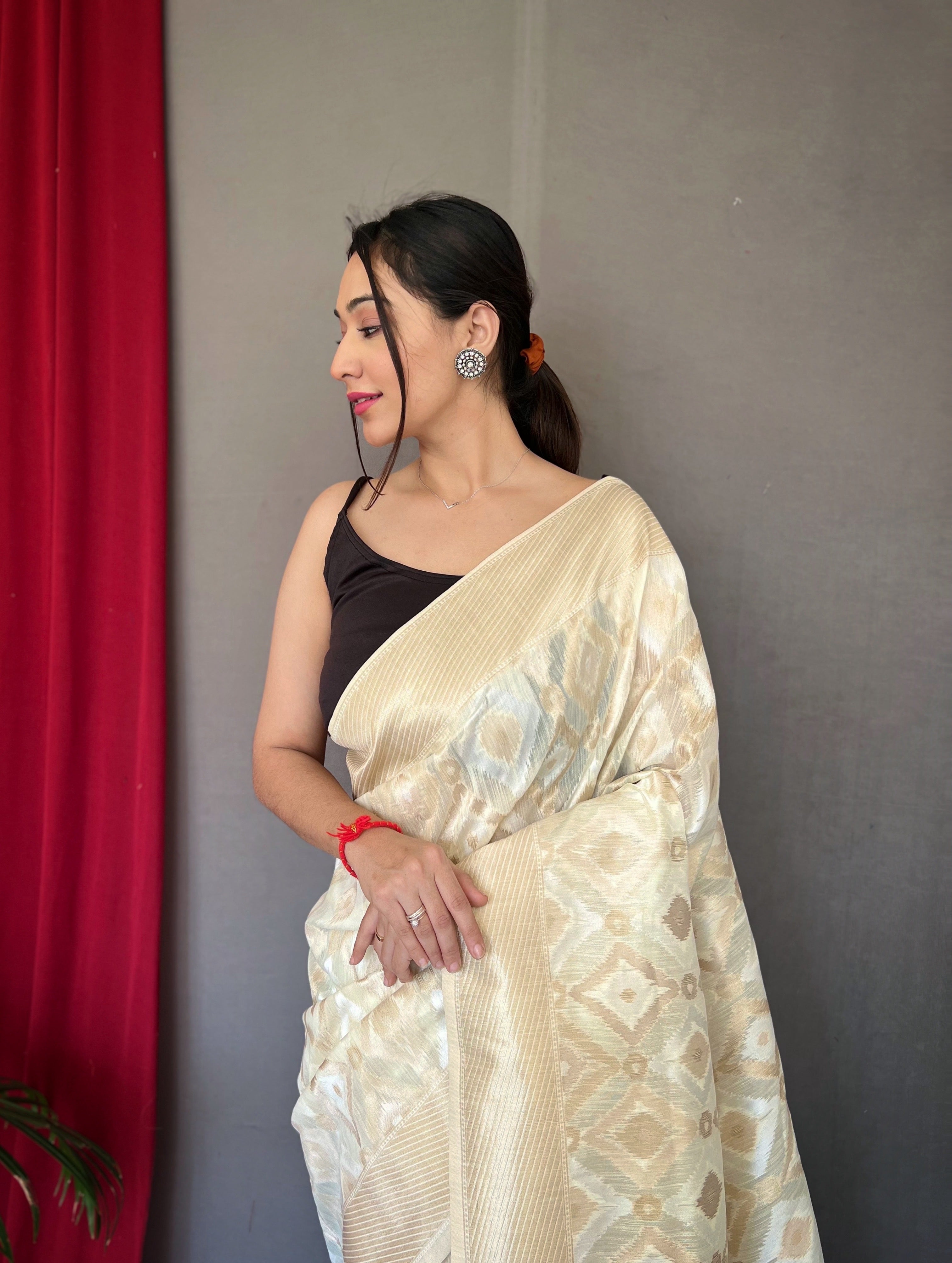 Muskaan Linen Ikat Woven Saree Ivory