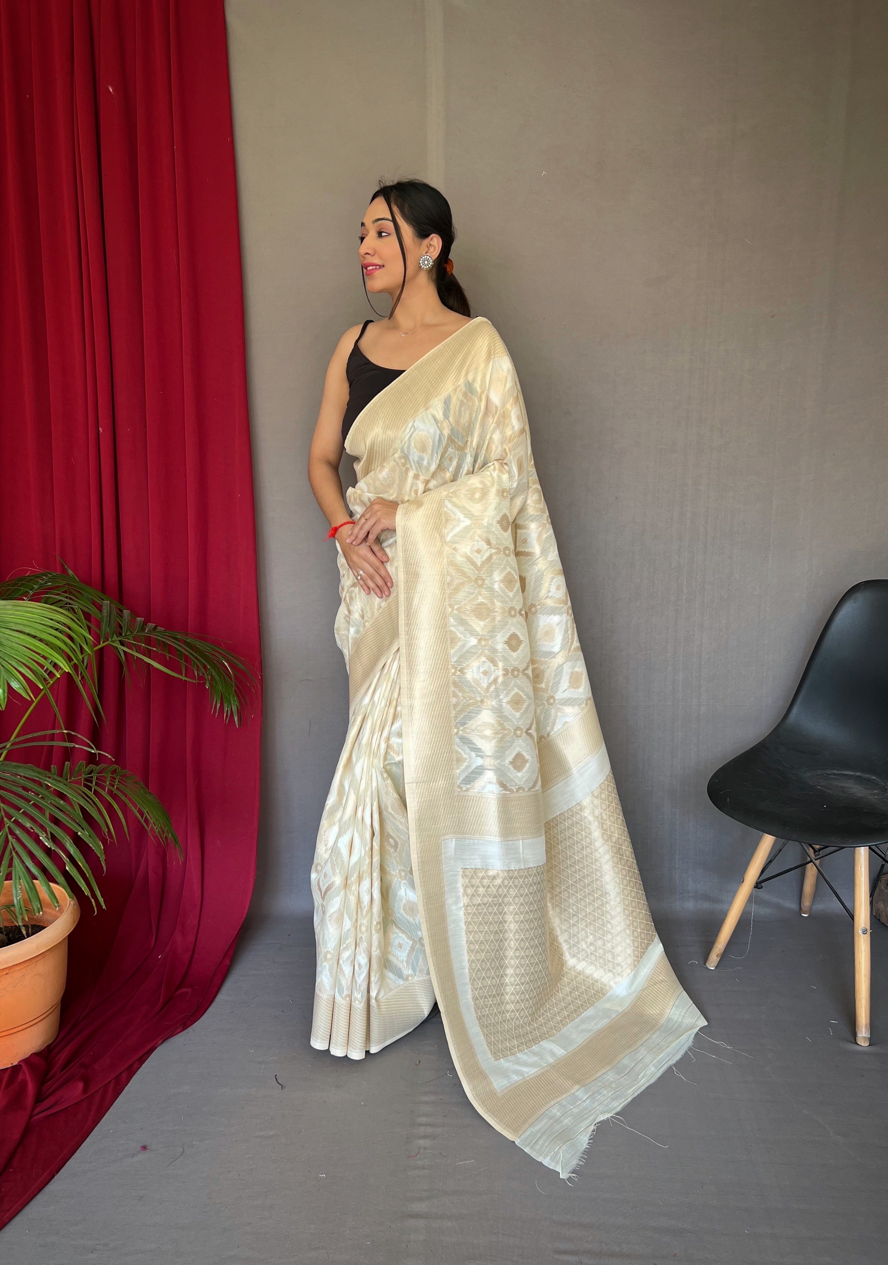 Muskaan Linen Ikat Woven Saree Ivory