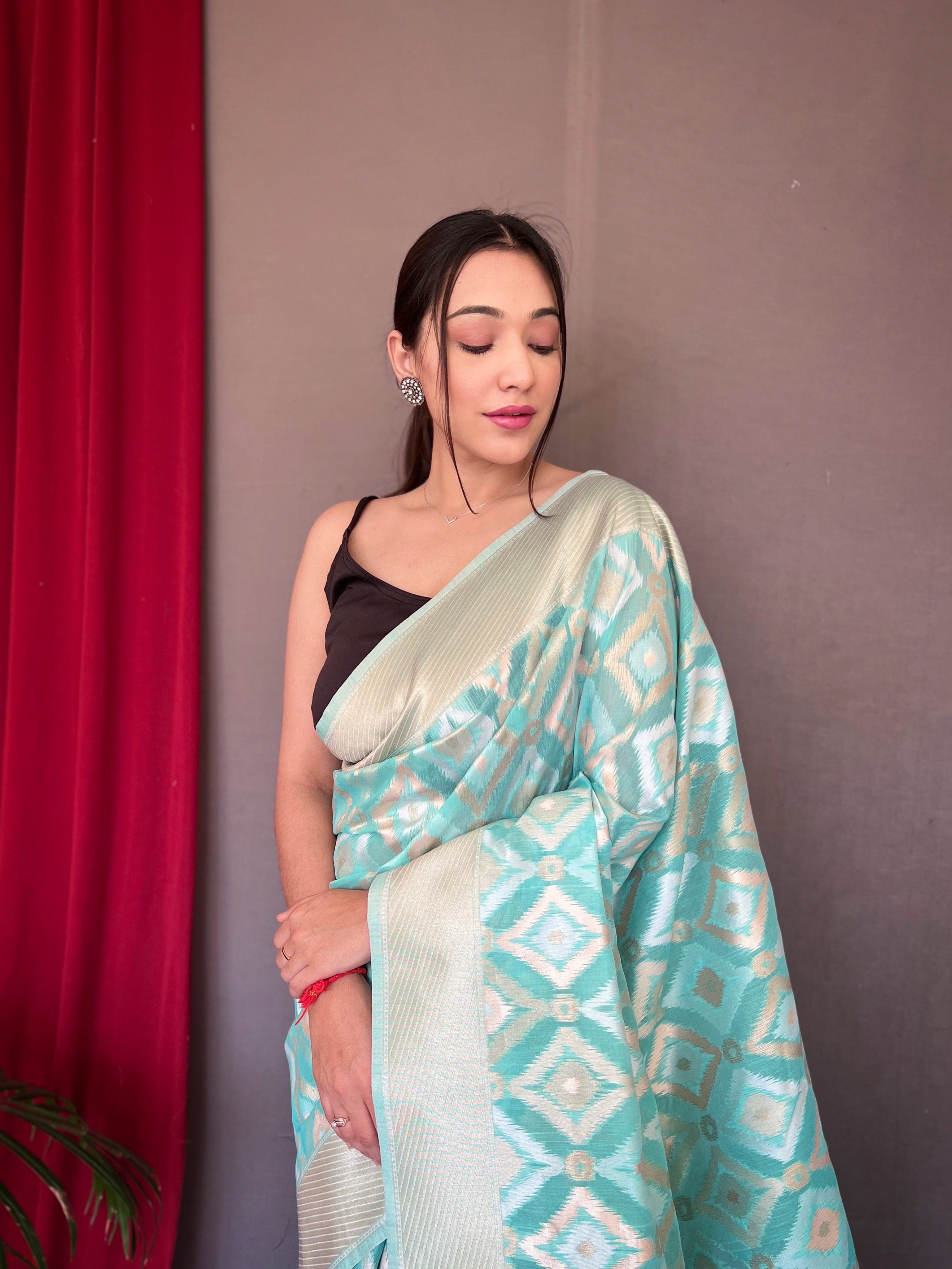 Muskaan Linen Ikat Woven Saree Turquoise