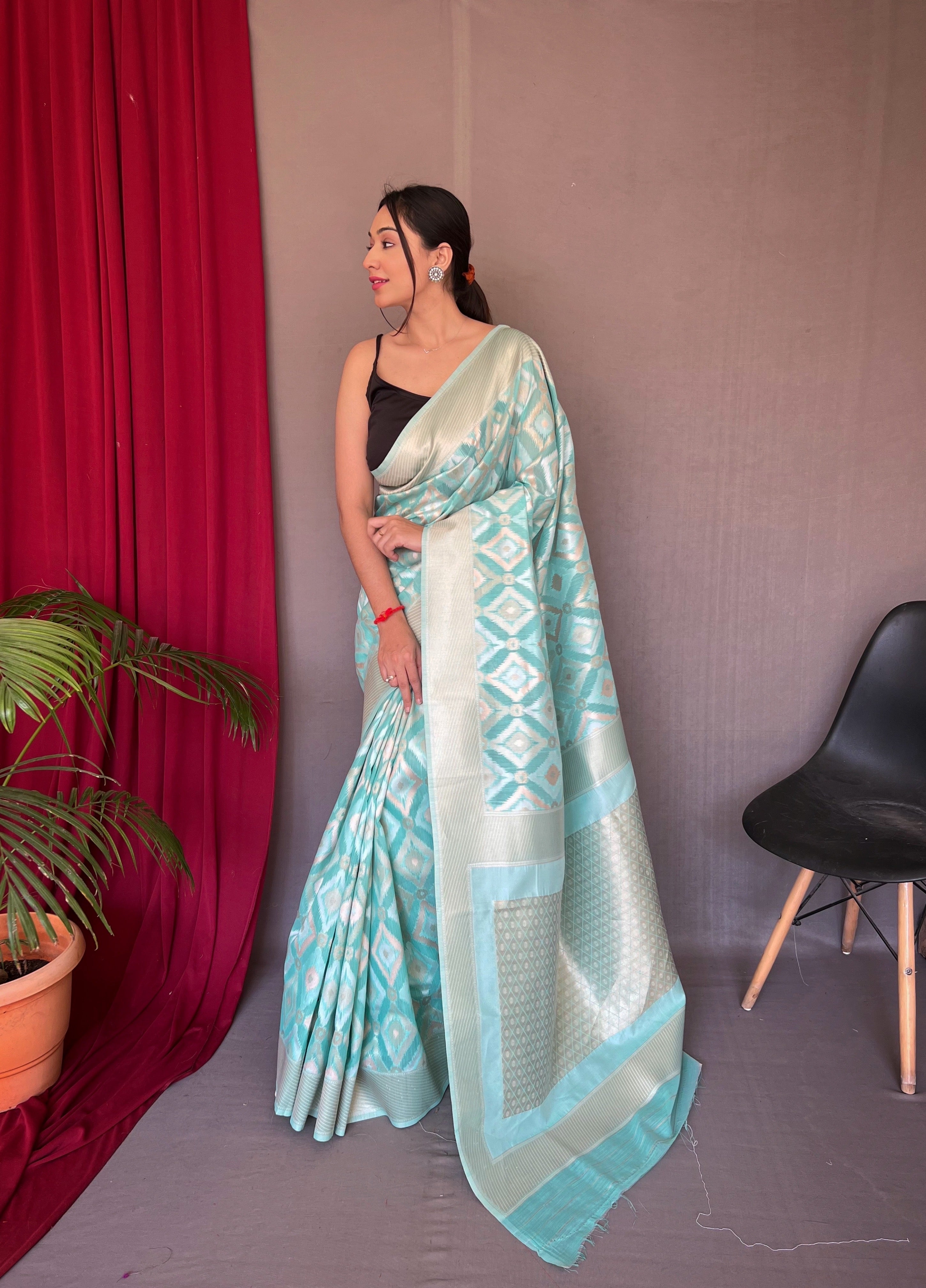 Muskaan Linen Ikat Woven Saree Turquoise