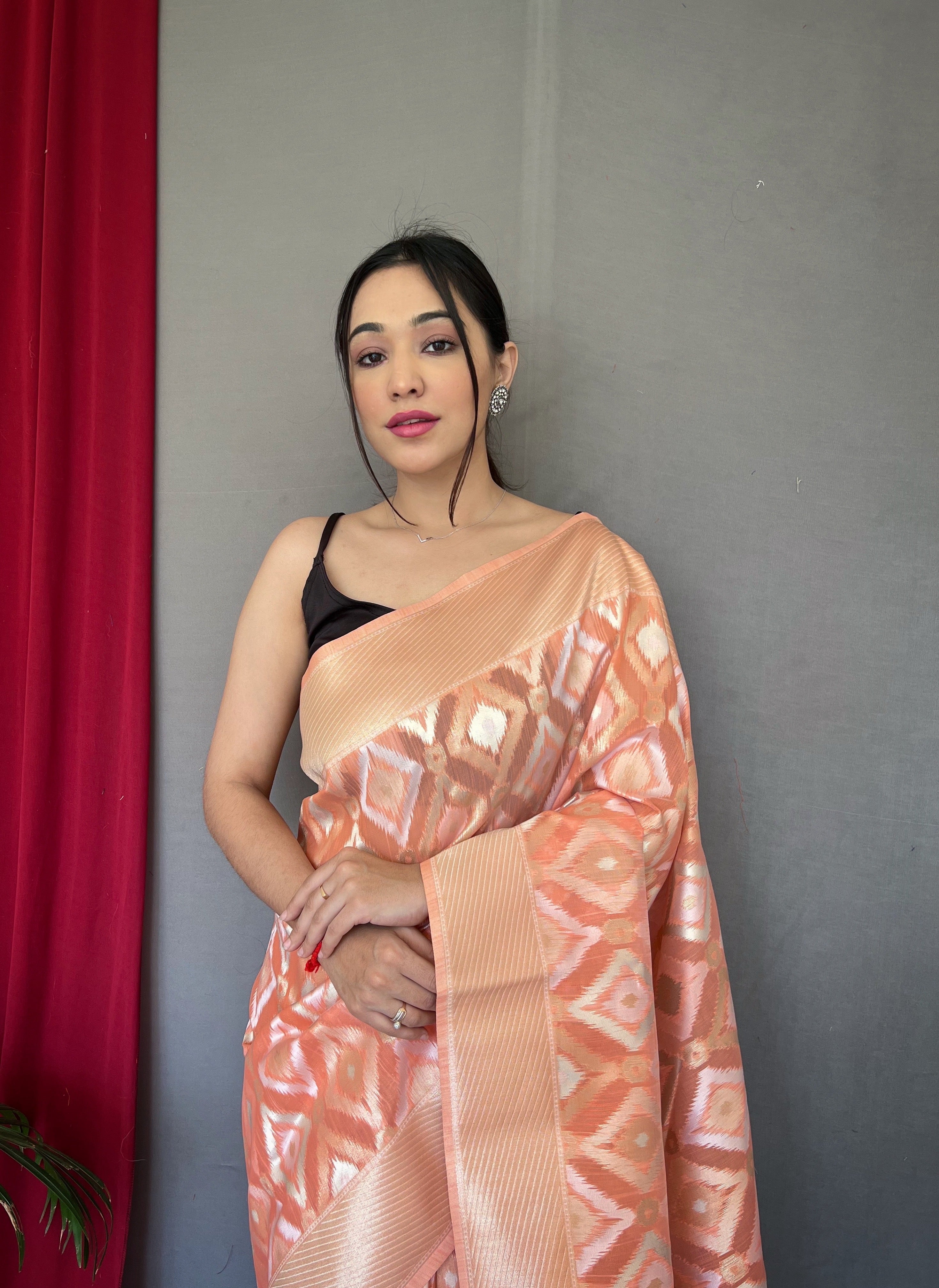 Muskaan Linen Ikat Woven Saree Peach